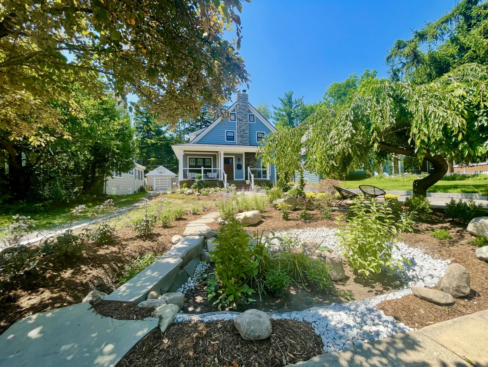 Full front garden with dry creek, stepping stones and weeping tree, Ann Arbor