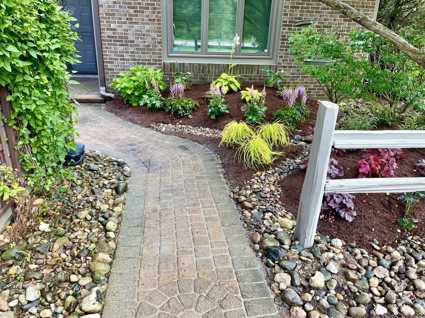 Finished river rock rain garden