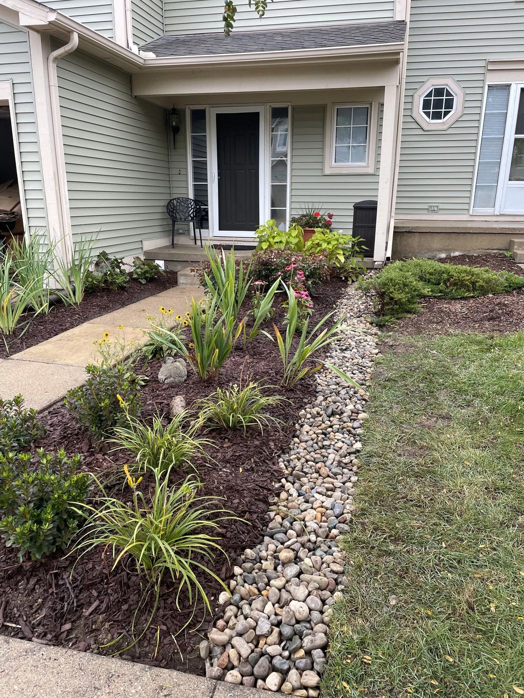 Finished drainage bed with perennial plantings