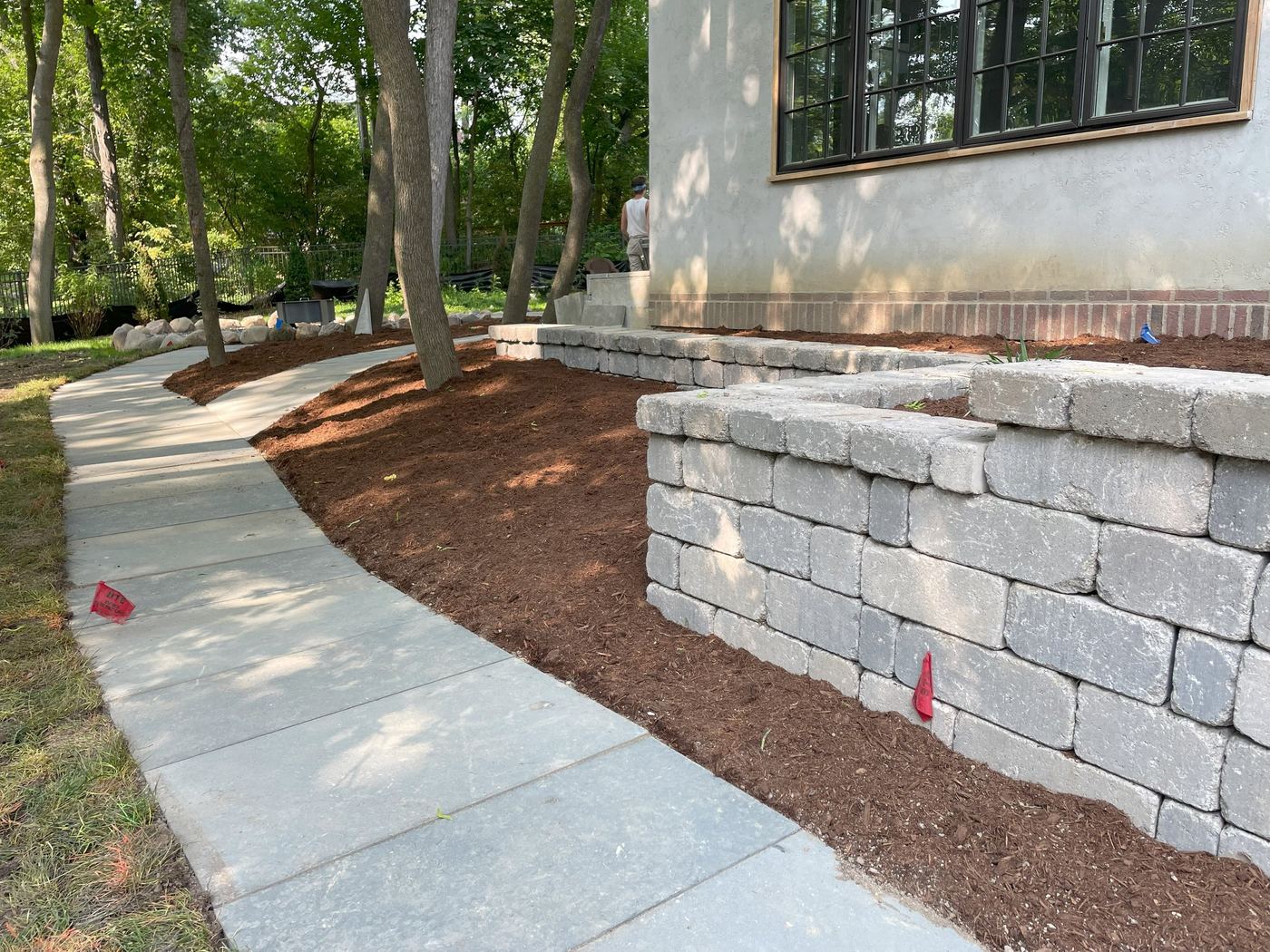 Tiered block retaining wall and walkway