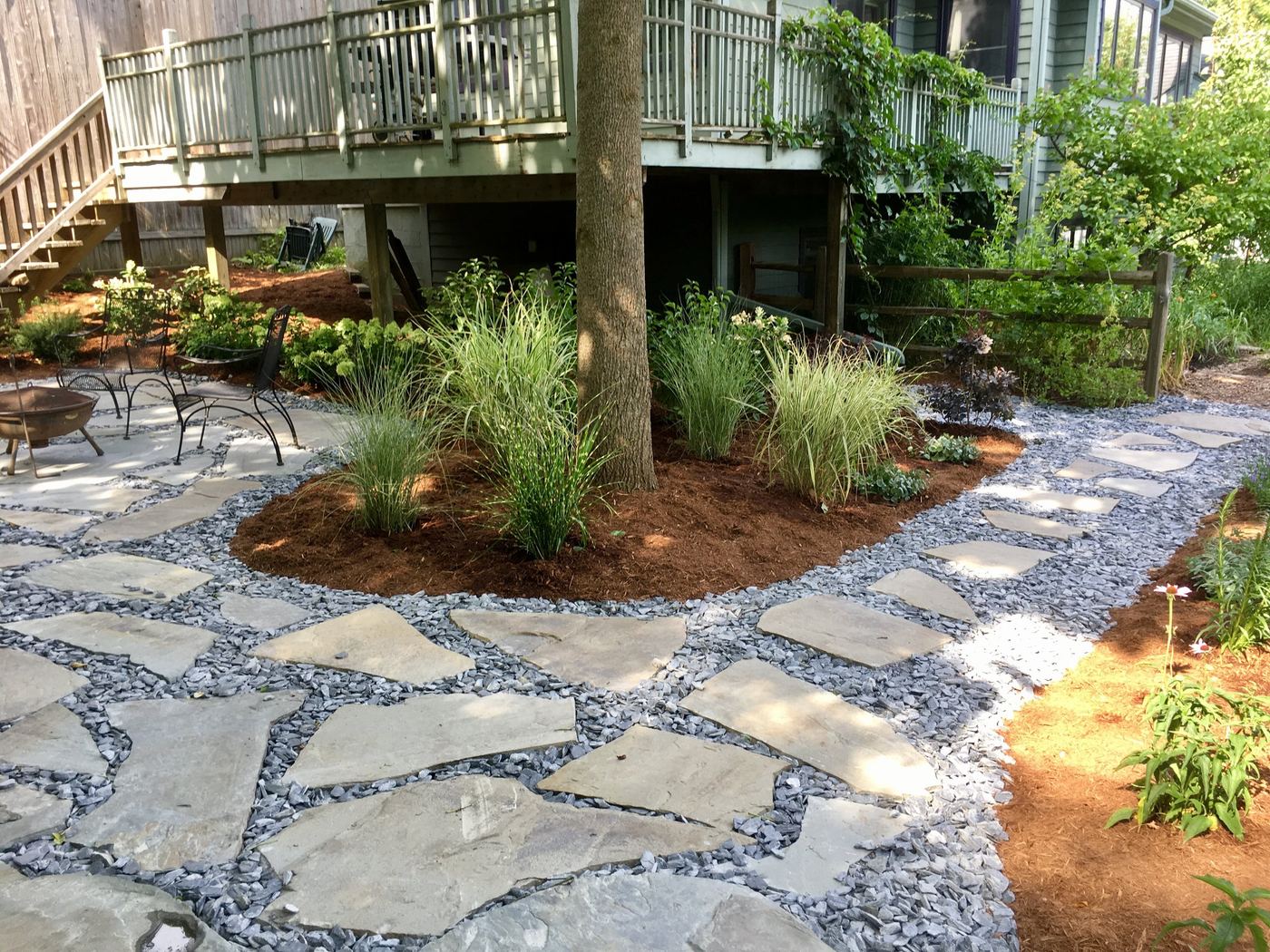Meditation garden stone path around shade tree, detail view