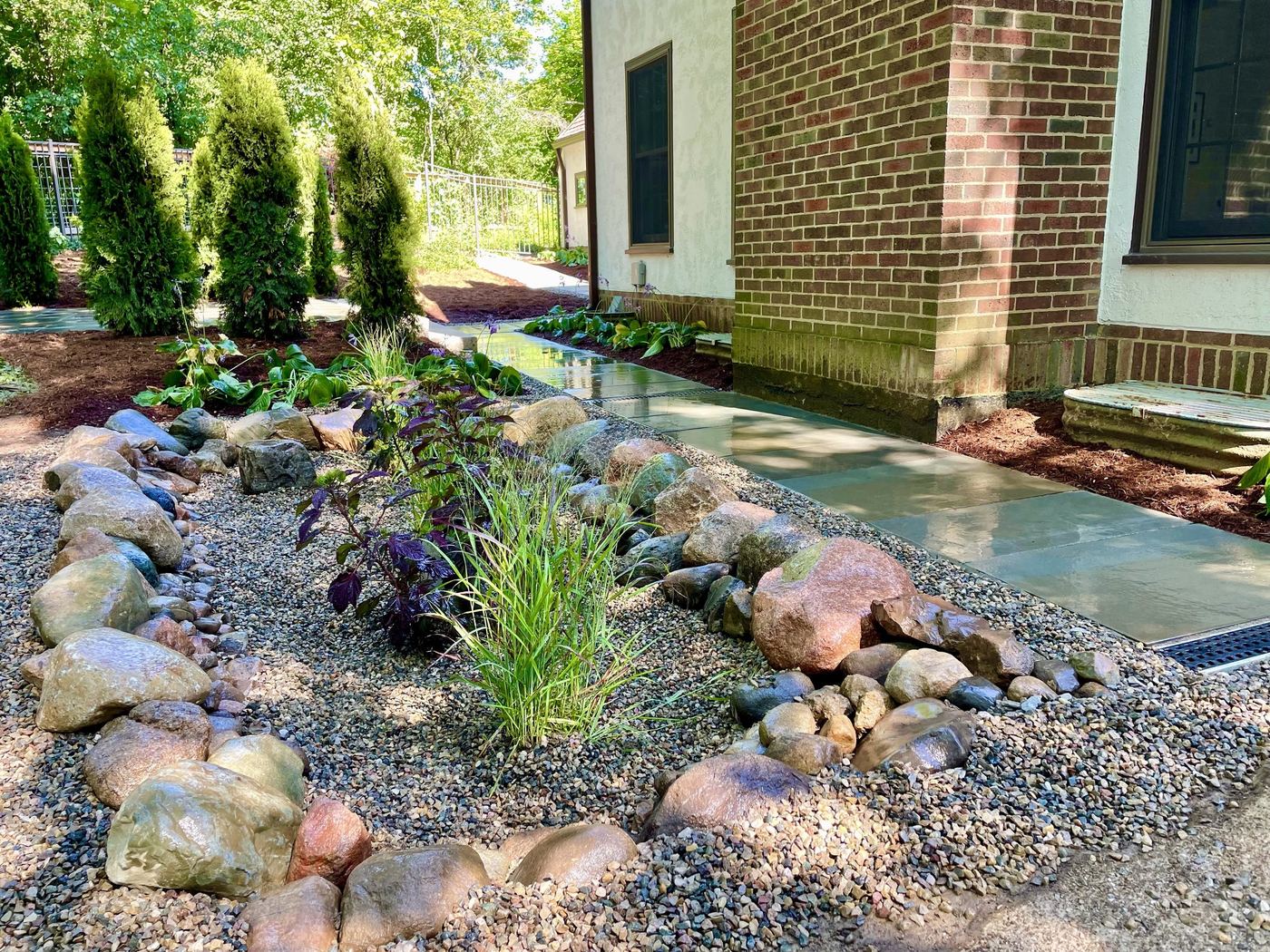 Finished rain garden and path after installation